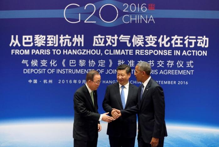 Chinese President Xi Jinping (C), UN Secretary General Ban Ki-moon and U.S. President Barack Obama (R) shake hands during a joint ratification of the Paris climate change agreement ceremony ahead of the G20 Summit at the West Lake State Guest House in Hangzhou, China, September 3, 2016. REUTERS/How Hwee Young/Pool